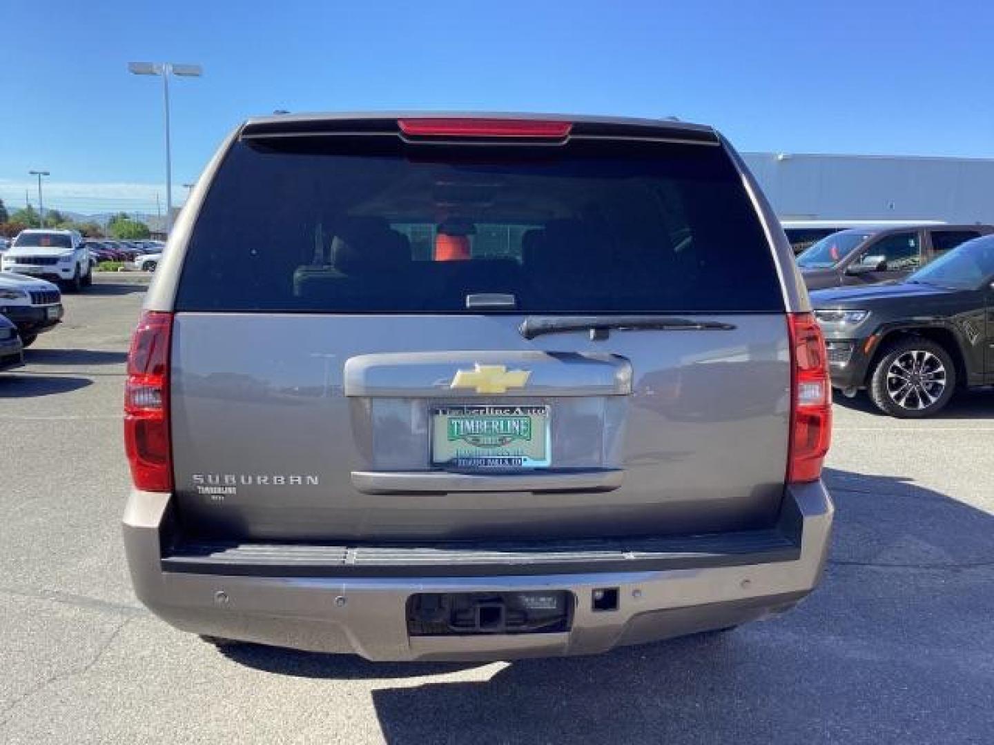 2013 GRAY /Ebony Leather Interior Chevrolet Suburban LTZ 1500 4WD (1GNSKJE71DR) with an 5.3L V8 OHV 16V FFV engine, 6-Speed Automatic transmission, located at 1235 N Woodruff Ave., Idaho Falls, 83401, (208) 523-1053, 43.507172, -112.000488 - At Timberline Auto, finding a great deal on your next vehicle is always easy! Our experienced sales staff's goal is to help find you the right vehicle at the right price! Our knowledgeable finance department has options for almost any credit score. We offer extended service contract options to prote - Photo#3