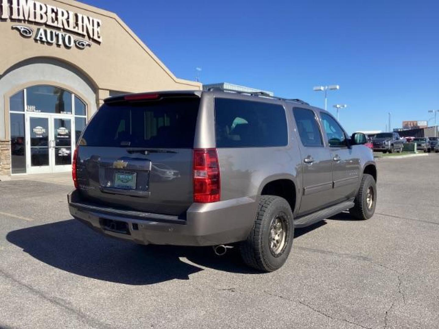 2013 GRAY /Ebony Leather Interior Chevrolet Suburban LTZ 1500 4WD (1GNSKJE71DR) with an 5.3L V8 OHV 16V FFV engine, 6-Speed Automatic transmission, located at 1235 N Woodruff Ave., Idaho Falls, 83401, (208) 523-1053, 43.507172, -112.000488 - At Timberline Auto, finding a great deal on your next vehicle is always easy! Our experienced sales staff's goal is to help find you the right vehicle at the right price! Our knowledgeable finance department has options for almost any credit score. We offer extended service contract options to prote - Photo#4