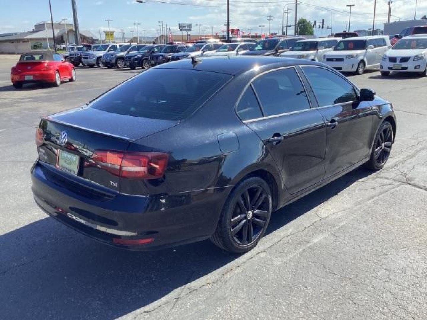 2018 Black /Titan Black w/Black Headliner, leatherette Volkswagen Jetta Sport 6A (3VWD17AJ7JM) with an 1.8L L4 DOHC 16V engine, 6-Speed Automatic transmission, located at 1235 N Woodruff Ave., Idaho Falls, 83401, (208) 523-1053, 43.507172, -112.000488 - The 2018 Volkswagen Jetta SE is a compact sedan that combines comfort, technology, and performance. Here is an overview of the key features of the 2018 Volkswagen Jetta SE: Engine and Performance Engine: 1.4-liter turbocharged inline-4 Horsepower: 150 hp @ 5,000 rpm Torque: 184 lb-ft @ 1,400-3,500 - Photo#4