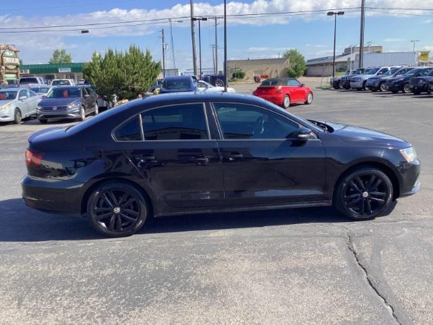 2018 Black /Titan Black w/Black Headliner, leatherette Volkswagen Jetta Sport 6A (3VWD17AJ7JM) with an 1.8L L4 DOHC 16V engine, 6-Speed Automatic transmission, located at 1235 N Woodruff Ave., Idaho Falls, 83401, (208) 523-1053, 43.507172, -112.000488 - The 2018 Volkswagen Jetta SE is a compact sedan that combines comfort, technology, and performance. Here is an overview of the key features of the 2018 Volkswagen Jetta SE: Engine and Performance Engine: 1.4-liter turbocharged inline-4 Horsepower: 150 hp @ 5,000 rpm Torque: 184 lb-ft @ 1,400-3,500 - Photo#5