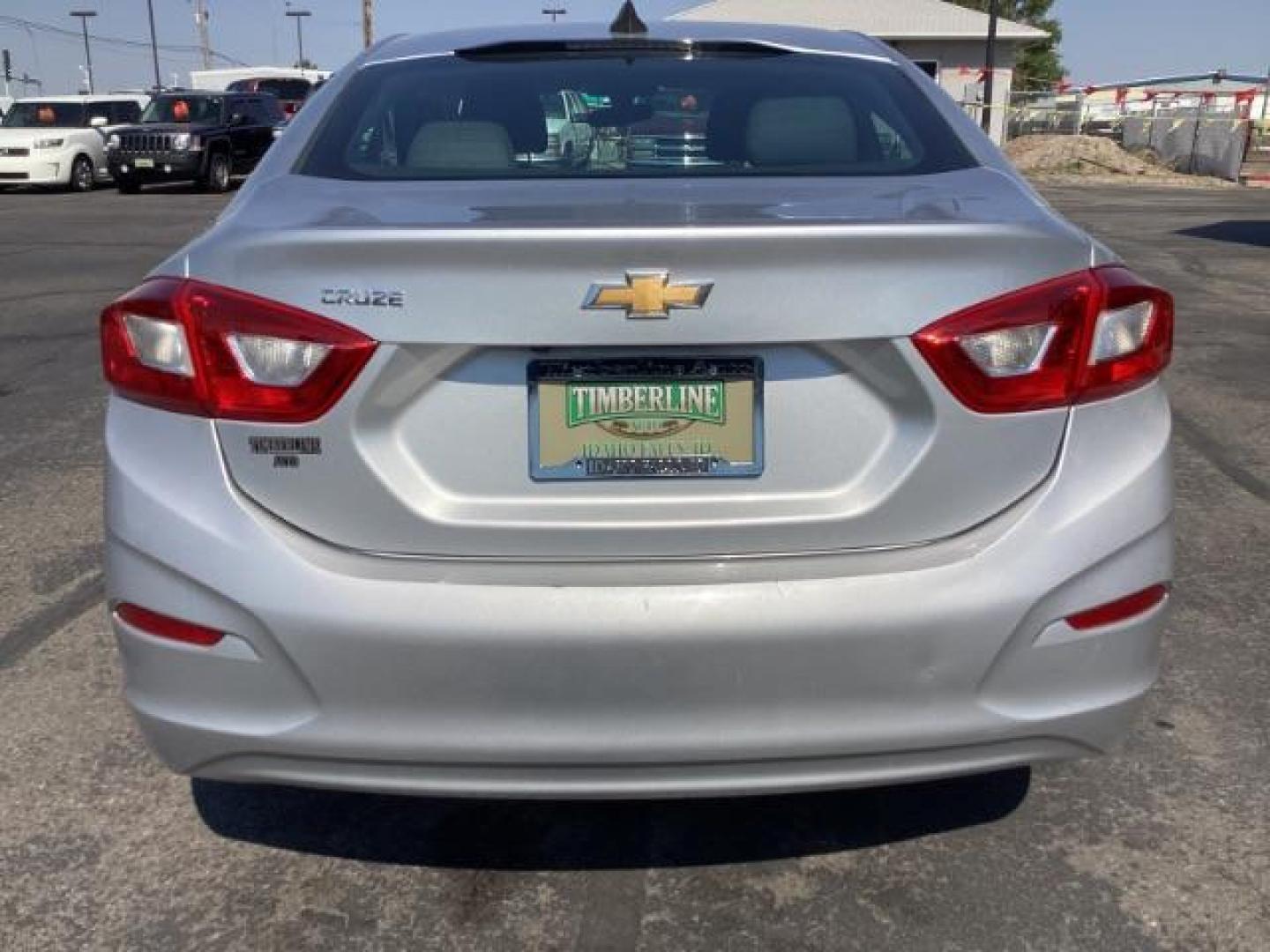 2017 Silver Ice Metallic Chevrolet Cruze SEDAN 4-DR (1G1BC5SM4H7) with an 1.4L L4 DOHC 16V TURBO engine, 6-Speed Automatic transmission, located at 1235 N Woodruff Ave., Idaho Falls, 83401, (208) 523-1053, 43.507172, -112.000488 - Photo#4