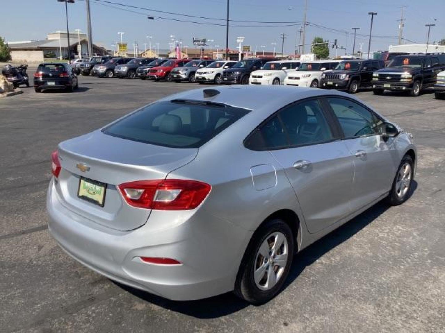 2017 Silver Ice Metallic Chevrolet Cruze SEDAN 4-DR (1G1BC5SM4H7) with an 1.4L L4 DOHC 16V TURBO engine, 6-Speed Automatic transmission, located at 1235 N Woodruff Ave., Idaho Falls, 83401, (208) 523-1053, 43.507172, -112.000488 - Photo#5