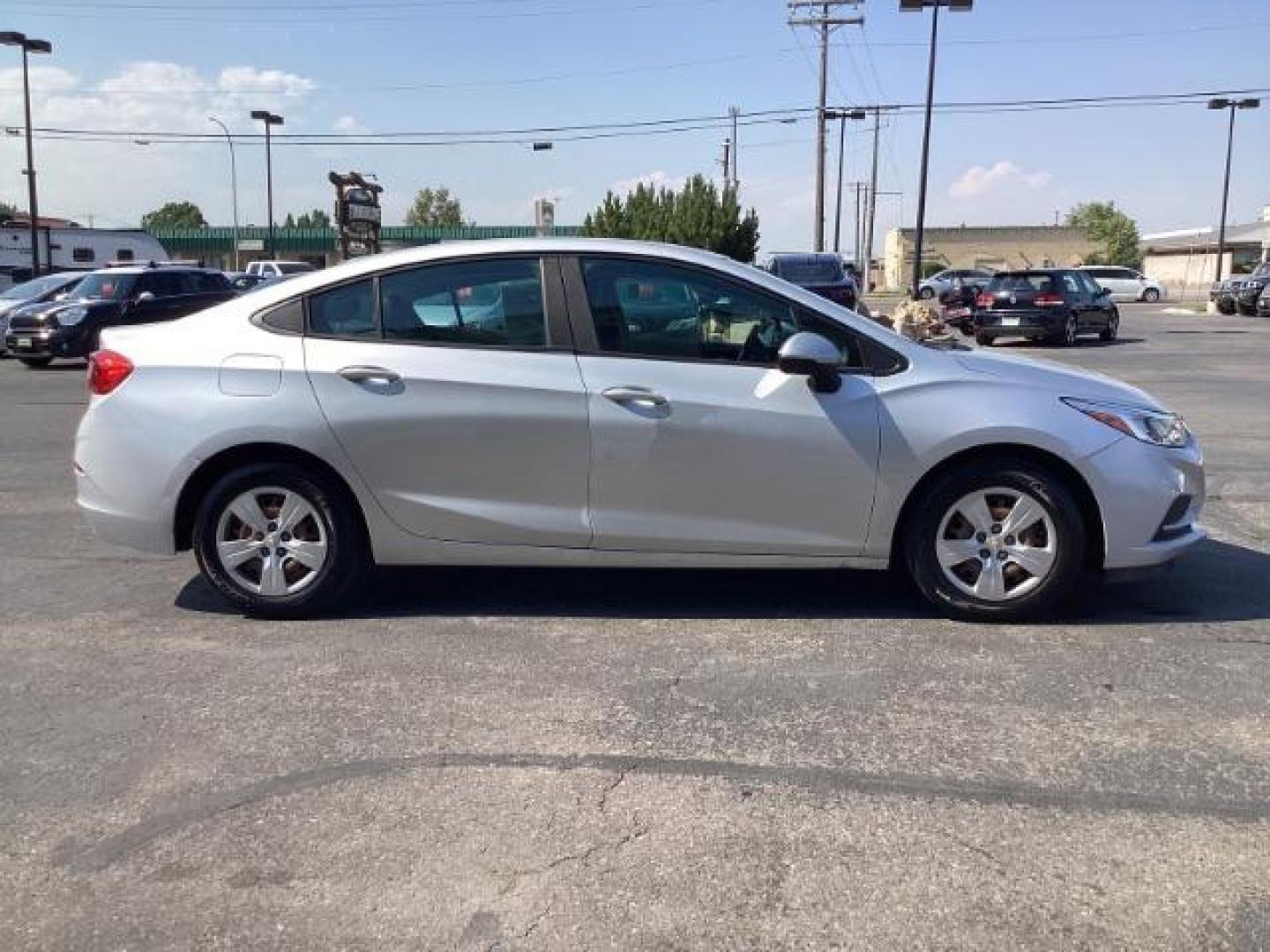 2017 Silver Ice Metallic Chevrolet Cruze SEDAN 4-DR (1G1BC5SM4H7) with an 1.4L L4 DOHC 16V TURBO engine, 6-Speed Automatic transmission, located at 1235 N Woodruff Ave., Idaho Falls, 83401, (208) 523-1053, 43.507172, -112.000488 - Photo#6