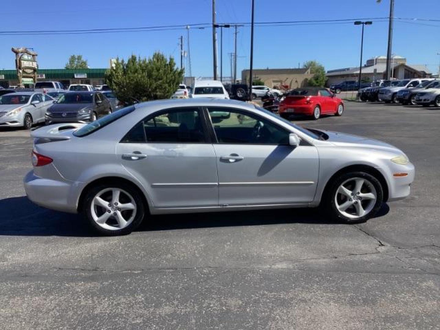 2005 Glacier Silver Metallic /Two-Tone Gray Cloth Seats Mazda Mazda6 i (1YVFP80C955) with an 2.3L L4 DOHC 16V engine, located at 1235 N Woodruff Ave., Idaho Falls, 83401, (208) 523-1053, 43.507172, -112.000488 - The 2005 Mazda 6 i was a well-rounded midsize sedan offering a mix of sporty performance, comfortable interior, and practical features. Here is a comprehensive overview of the features available on the 2005 Mazda 6 i:Engine: 2.3-liter DOHC 16-valve inline-4,Seating: Cloth upholstery ,Seats: 5-passen - Photo#5