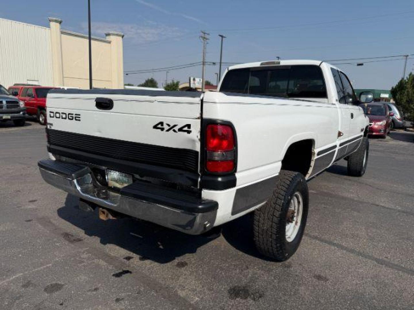 1999 WHITE /CLOTH Dodge Ram 2500 (1B7KF2365XJ) with an 59 engine, Manual transmission, located at 1175 N Woodruff Ave, Idaho Falls, ID, 83401, 43.506901, -111.999657 - At Timberline Auto, finding a great deal on your next vehicle is always easy! Our experienced sales staff's goal is to help find you the right vehicle at the right price! Our knowledgeable finance department has options for almost any credit score. We offer extended service contract options to prote - Photo#20