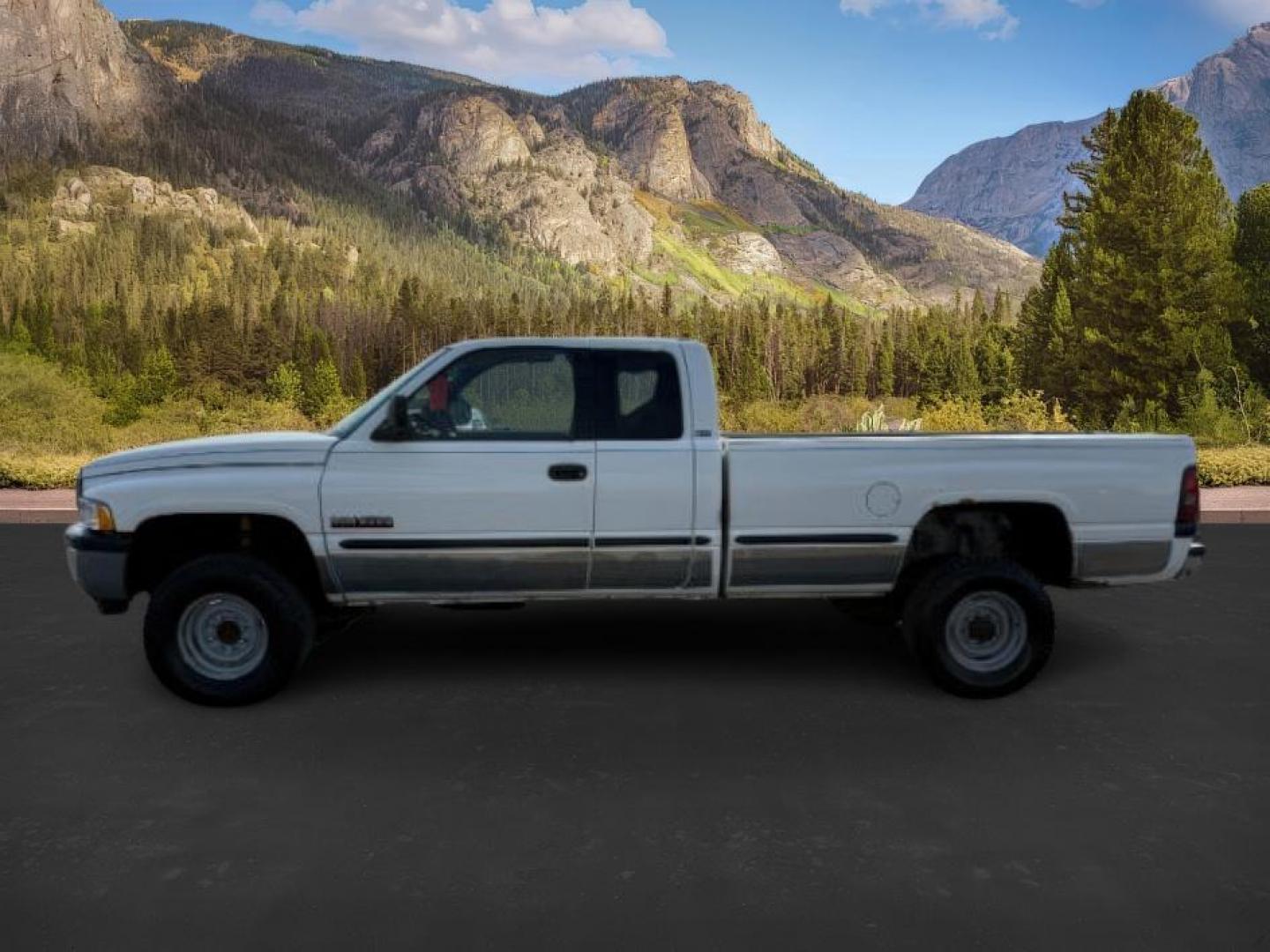 1999 WHITE /CLOTH Dodge Ram 2500 (1B7KF2365XJ) with an 59 engine, Manual transmission, located at 1175 N Woodruff Ave, Idaho Falls, ID, 83401, 43.506901, -111.999657 - At Timberline Auto, finding a great deal on your next vehicle is always easy! Our experienced sales staff's goal is to help find you the right vehicle at the right price! Our knowledgeable finance department has options for almost any credit score. We offer extended service contract options to prote - Photo#1