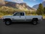 1999 WHITE /CLOTH Dodge Ram 2500 (1B7KF2365XJ) with an 59 engine, Manual transmission, located at 1175 N Woodruff Ave, Idaho Falls, ID, 83401, 43.506901, -111.999657 - At Timberline Auto, finding a great deal on your next vehicle is always easy! Our experienced sales staff's goal is to help find you the right vehicle at the right price! Our knowledgeable finance department has options for almost any credit score. We offer extended service contract options to prote - Photo#1