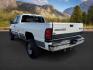 1999 WHITE /CLOTH Dodge Ram 2500 (1B7KF2365XJ) with an 59 engine, Manual transmission, located at 1175 N Woodruff Ave, Idaho Falls, ID, 83401, 43.506901, -111.999657 - At Timberline Auto, finding a great deal on your next vehicle is always easy! Our experienced sales staff's goal is to help find you the right vehicle at the right price! Our knowledgeable finance department has options for almost any credit score. We offer extended service contract options to prote - Photo#2