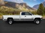 1999 WHITE /CLOTH Dodge Ram 2500 (1B7KF2365XJ) with an 59 engine, Manual transmission, located at 1175 N Woodruff Ave, Idaho Falls, ID, 83401, 43.506901, -111.999657 - At Timberline Auto, finding a great deal on your next vehicle is always easy! Our experienced sales staff's goal is to help find you the right vehicle at the right price! Our knowledgeable finance department has options for almost any credit score. We offer extended service contract options to prote - Photo#5
