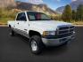 1999 WHITE /CLOTH Dodge Ram 2500 (1B7KF2365XJ) with an 59 engine, Manual transmission, located at 1175 N Woodruff Ave, Idaho Falls, ID, 83401, 43.506901, -111.999657 - At Timberline Auto, finding a great deal on your next vehicle is always easy! Our experienced sales staff's goal is to help find you the right vehicle at the right price! Our knowledgeable finance department has options for almost any credit score. We offer extended service contract options to prote - Photo#6