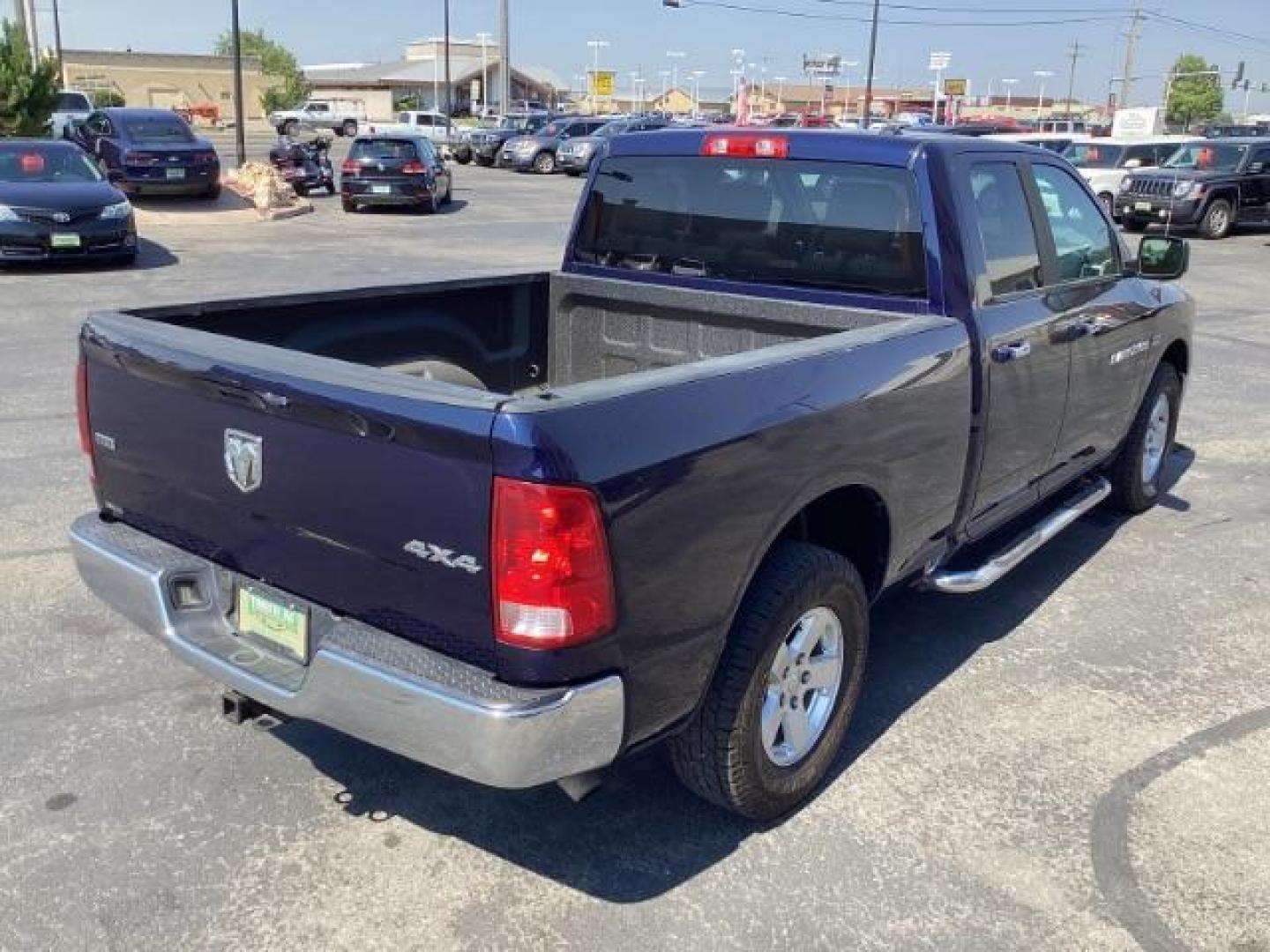 2012 BLUE /Dark Slate/Medium Graystone Cloth Interior RAM 1500 SLT Quad Cab 4WD (1C6RD7GT3CS) with an 5.7L V8 OHV 16V engine, 5-Speed Automatic transmission, located at 1235 N Woodruff Ave., Idaho Falls, 83401, (208) 523-1053, 43.507172, -112.000488 - Photo#5