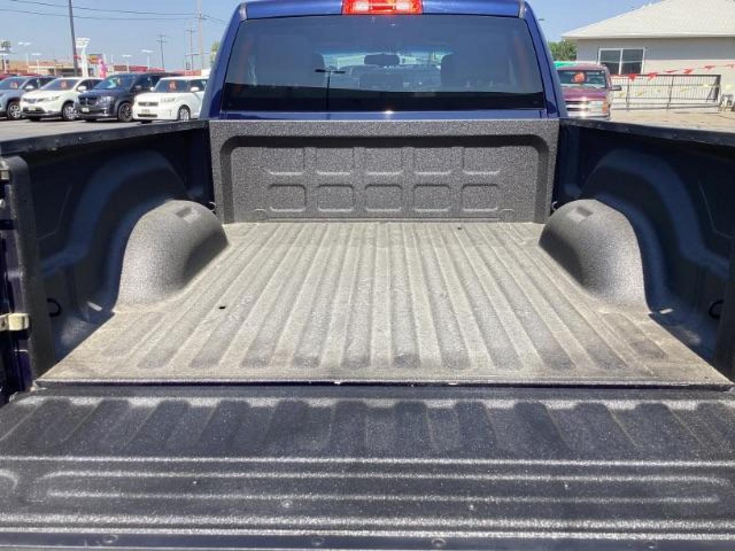 2012 BLUE /Dark Slate/Medium Graystone Cloth Interior RAM 1500 SLT Quad Cab 4WD (1C6RD7GT3CS) with an 5.7L V8 OHV 16V engine, 5-Speed Automatic transmission, located at 1235 N Woodruff Ave., Idaho Falls, 83401, (208) 523-1053, 43.507172, -112.000488 - Photo#11