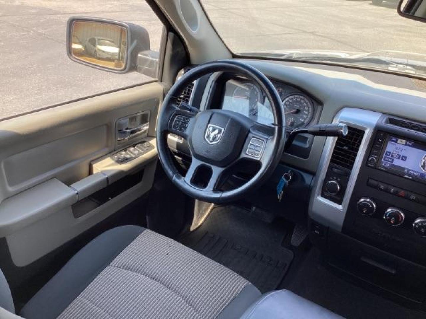 2012 BLUE /Dark Slate/Medium Graystone Cloth Interior RAM 1500 SLT Quad Cab 4WD (1C6RD7GT3CS) with an 5.7L V8 OHV 16V engine, 5-Speed Automatic transmission, located at 1235 N Woodruff Ave., Idaho Falls, 83401, (208) 523-1053, 43.507172, -112.000488 - Photo#15