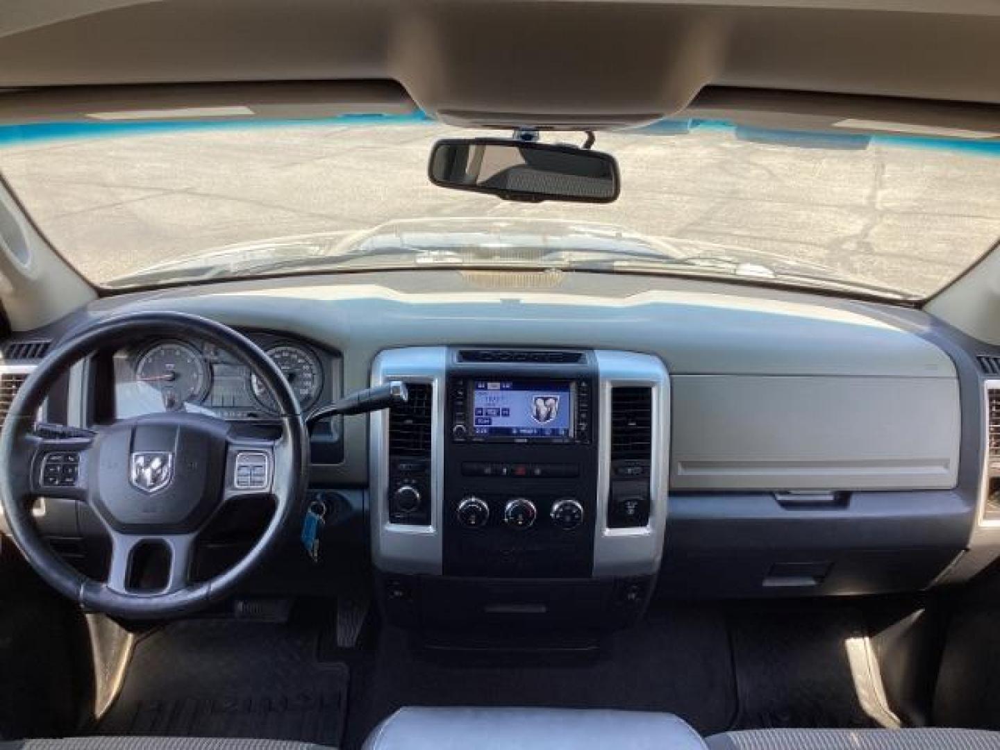 2012 BLUE /Dark Slate/Medium Graystone Cloth Interior RAM 1500 SLT Quad Cab 4WD (1C6RD7GT3CS) with an 5.7L V8 OHV 16V engine, 5-Speed Automatic transmission, located at 1235 N Woodruff Ave., Idaho Falls, 83401, (208) 523-1053, 43.507172, -112.000488 - Photo#18