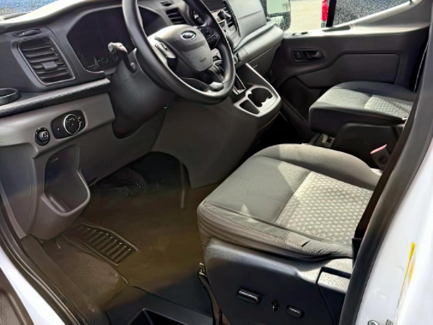2020 WHITE /CLOTH Ford Transit (1FBAX9Y80LK) with an 35L V6 DOHC 24V engine, Automatic transmission, located at 1175 N Woodruff Ave, Idaho Falls, ID, 83401, 43.506901, -111.999657 - At Timberline Auto, finding a great deal on your next vehicle is always easy! Our experienced sales staff's goal is to help find you the right vehicle at the right price! Our knowledgeable finance department has options for almost any credit score. We offer extended service contract options to prote - Photo#6