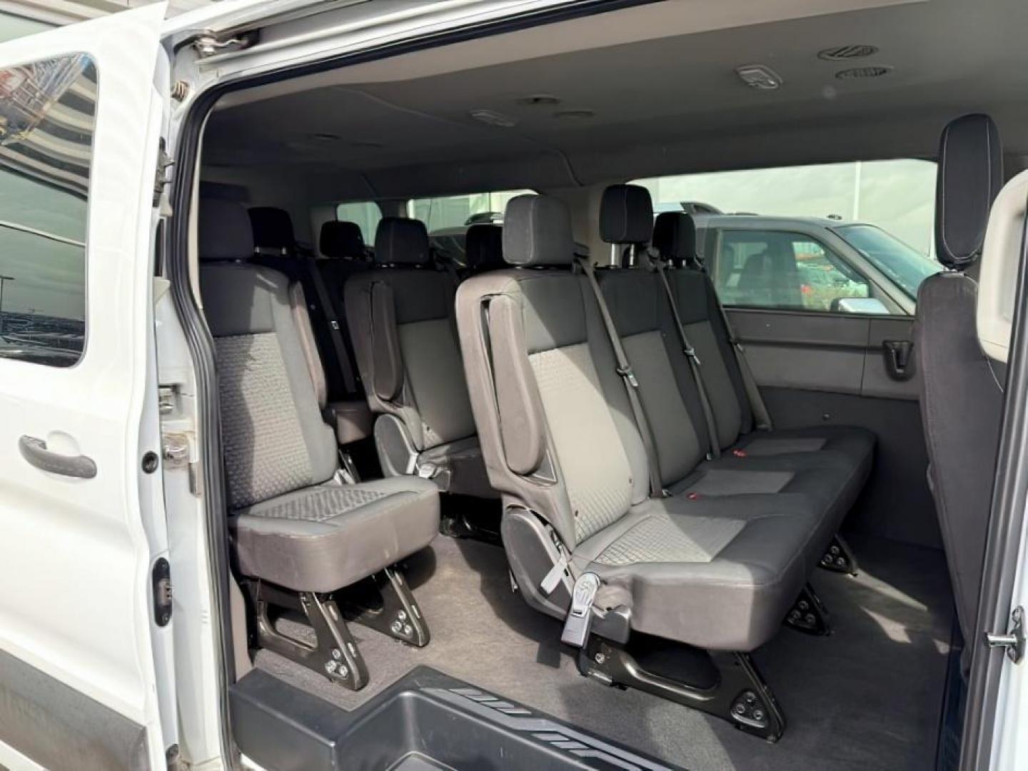 2020 WHITE /CLOTH Ford Transit (1FBAX9Y80LK) with an 35L V6 DOHC 24V engine, Automatic transmission, located at 1175 N Woodruff Ave, Idaho Falls, ID, 83401, 43.506901, -111.999657 - At Timberline Auto, finding a great deal on your next vehicle is always easy! Our experienced sales staff's goal is to help find you the right vehicle at the right price! Our knowledgeable finance department has options for almost any credit score. We offer extended service contract options to prote - Photo#11