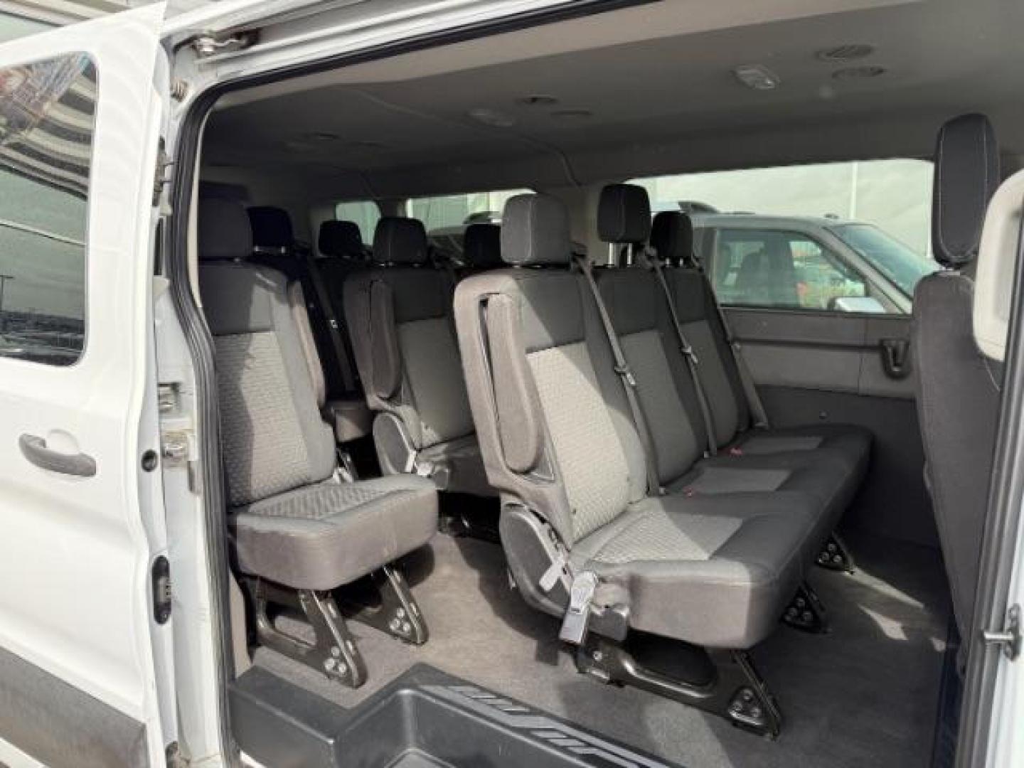 2020 WHITE /CLOTH Ford Transit 350 Wagon Low Roof XLT w/Sliding Pass. 148-in. WB (1FBAX9Y80LK) with an 3.5L V6 DOHC 24V engine, 6-Speed Automatic transmission, located at 1235 N Woodruff Ave., Idaho Falls, 83401, (208) 523-1053, 43.507172, -112.000488 - At Timberline Auto, finding a great deal on your next vehicle is always easy! Our experienced sales staff's goal is to help find you the right vehicle at the right price! Our knowledgeable finance department has options for almost any credit score. We offer extended service contract options to prote - Photo#11