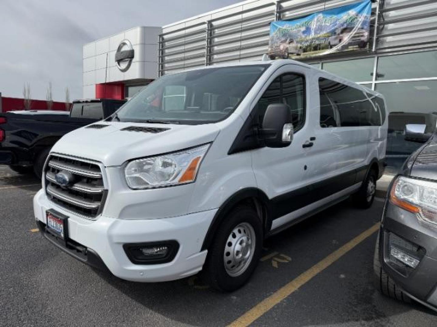 2020 WHITE /CLOTH Ford Transit 350 Wagon Low Roof XLT w/Sliding Pass. 148-in. WB (1FBAX9Y80LK) with an 3.5L V6 DOHC 24V engine, 6-Speed Automatic transmission, located at 1235 N Woodruff Ave., Idaho Falls, 83401, (208) 523-1053, 43.507172, -112.000488 - At Timberline Auto, finding a great deal on your next vehicle is always easy! Our experienced sales staff's goal is to help find you the right vehicle at the right price! Our knowledgeable finance department has options for almost any credit score. We offer extended service contract options to prote - Photo#1