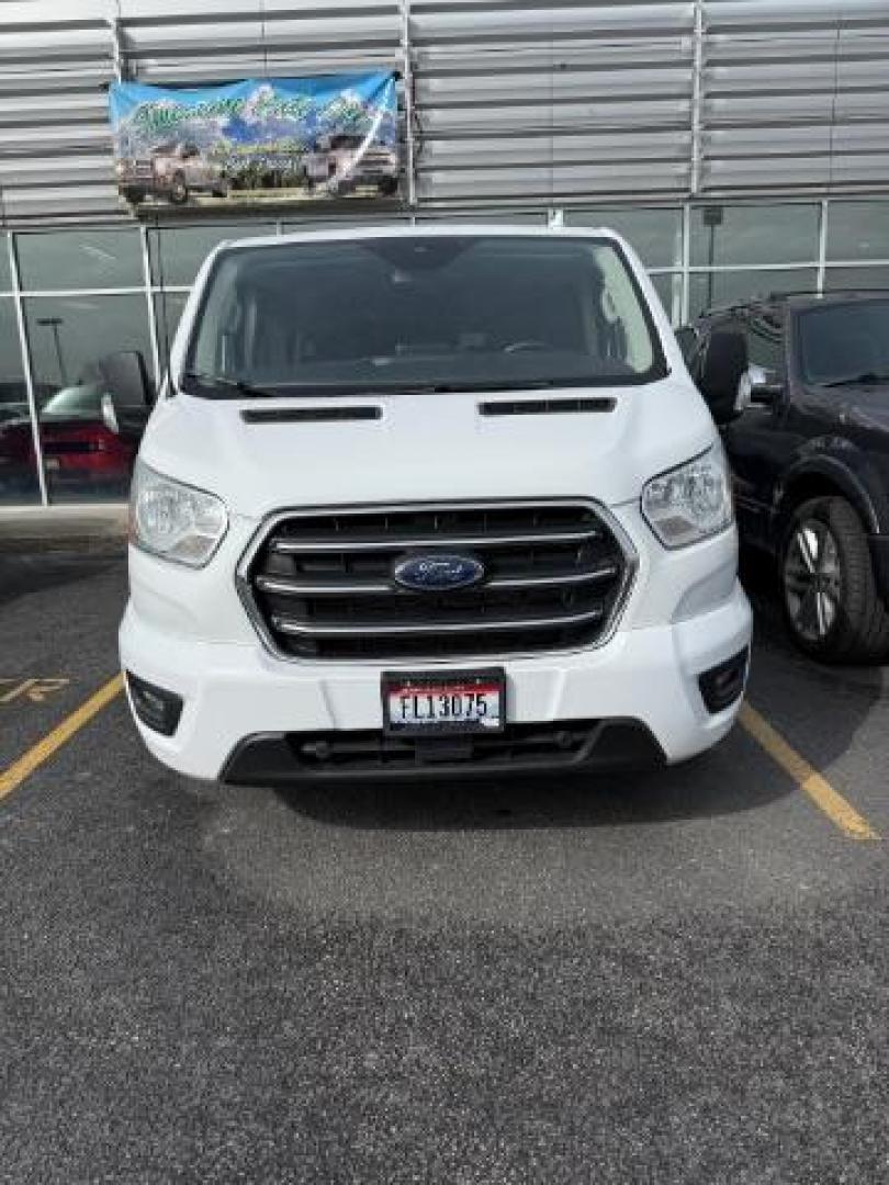 2020 WHITE /CLOTH Ford Transit 350 Wagon Low Roof XLT w/Sliding Pass. 148-in. WB (1FBAX9Y80LK) with an 3.5L V6 DOHC 24V engine, 6-Speed Automatic transmission, located at 1235 N Woodruff Ave., Idaho Falls, 83401, (208) 523-1053, 43.507172, -112.000488 - At Timberline Auto, finding a great deal on your next vehicle is always easy! Our experienced sales staff's goal is to help find you the right vehicle at the right price! Our knowledgeable finance department has options for almost any credit score. We offer extended service contract options to prote - Photo#2