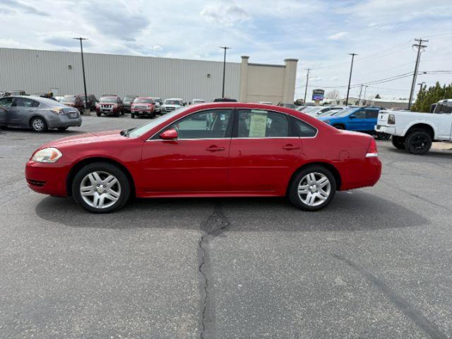 2012 RED /CLOTH Chevrolet Impala LT (Fleet) (2G1WG5E34C1) with an 3.6L V6 DOHC 16V FFV engine, 6-Speed Automatic transmission, located at 1235 N Woodruff Ave., Idaho Falls, 83401, (208) 523-1053, 43.507172, -112.000488 - At Timberline Auto, finding a great deal on your next vehicle is always easy! Our experienced sales staff's goal is to help find you the right vehicle at the right price! Our knowledgeable finance department has options for almost any credit score. We offer extended service contract options to prote - Photo#1