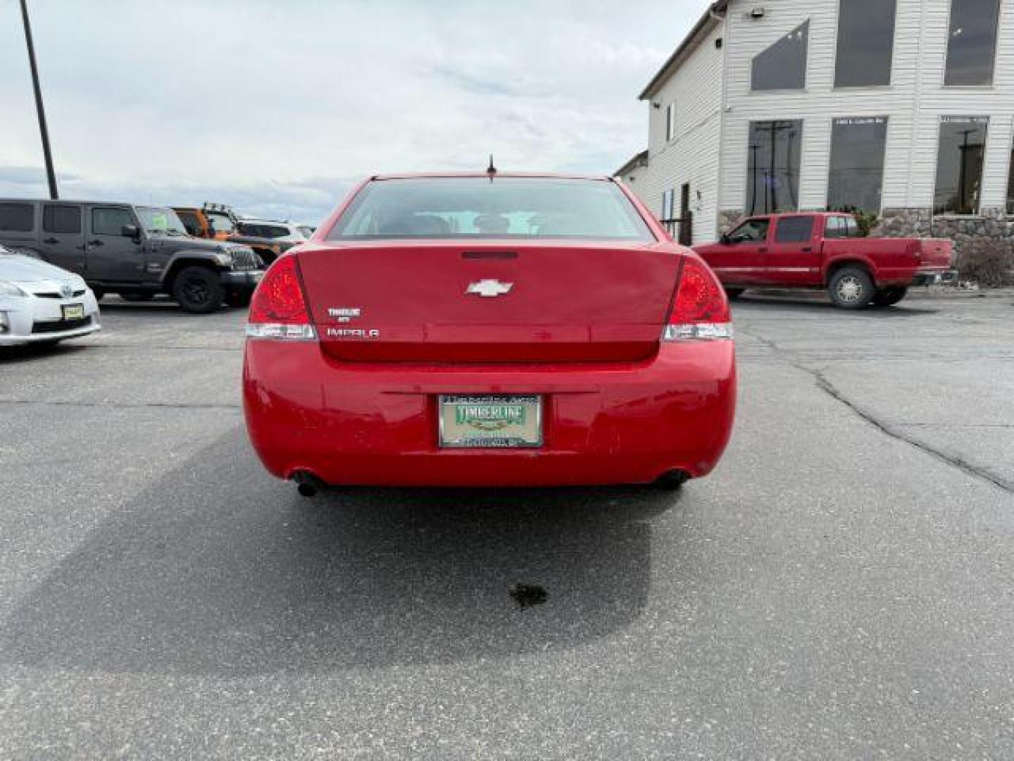 2012 RED /CLOTH Chevrolet Impala LT (Fleet) (2G1WG5E34C1) with an 3.6L V6 DOHC 16V FFV engine, 6-Speed Automatic transmission, located at 1235 N Woodruff Ave., Idaho Falls, 83401, (208) 523-1053, 43.507172, -112.000488 - At Timberline Auto, finding a great deal on your next vehicle is always easy! Our experienced sales staff's goal is to help find you the right vehicle at the right price! Our knowledgeable finance department has options for almost any credit score. We offer extended service contract options to prote - Photo#3