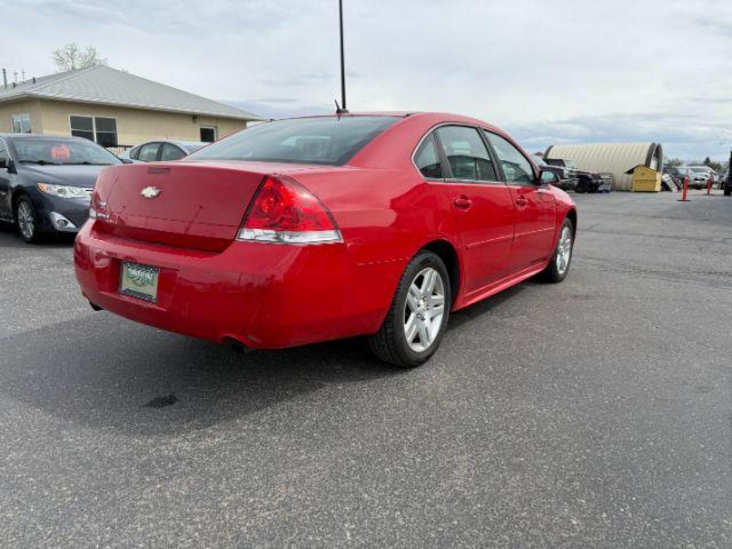 2012 RED /CLOTH Chevrolet Impala LT (Fleet) (2G1WG5E34C1) with an 3.6L V6 DOHC 16V FFV engine, 6-Speed Automatic transmission, located at 1235 N Woodruff Ave., Idaho Falls, 83401, (208) 523-1053, 43.507172, -112.000488 - At Timberline Auto, finding a great deal on your next vehicle is always easy! Our experienced sales staff's goal is to help find you the right vehicle at the right price! Our knowledgeable finance department has options for almost any credit score. We offer extended service contract options to prote - Photo#4