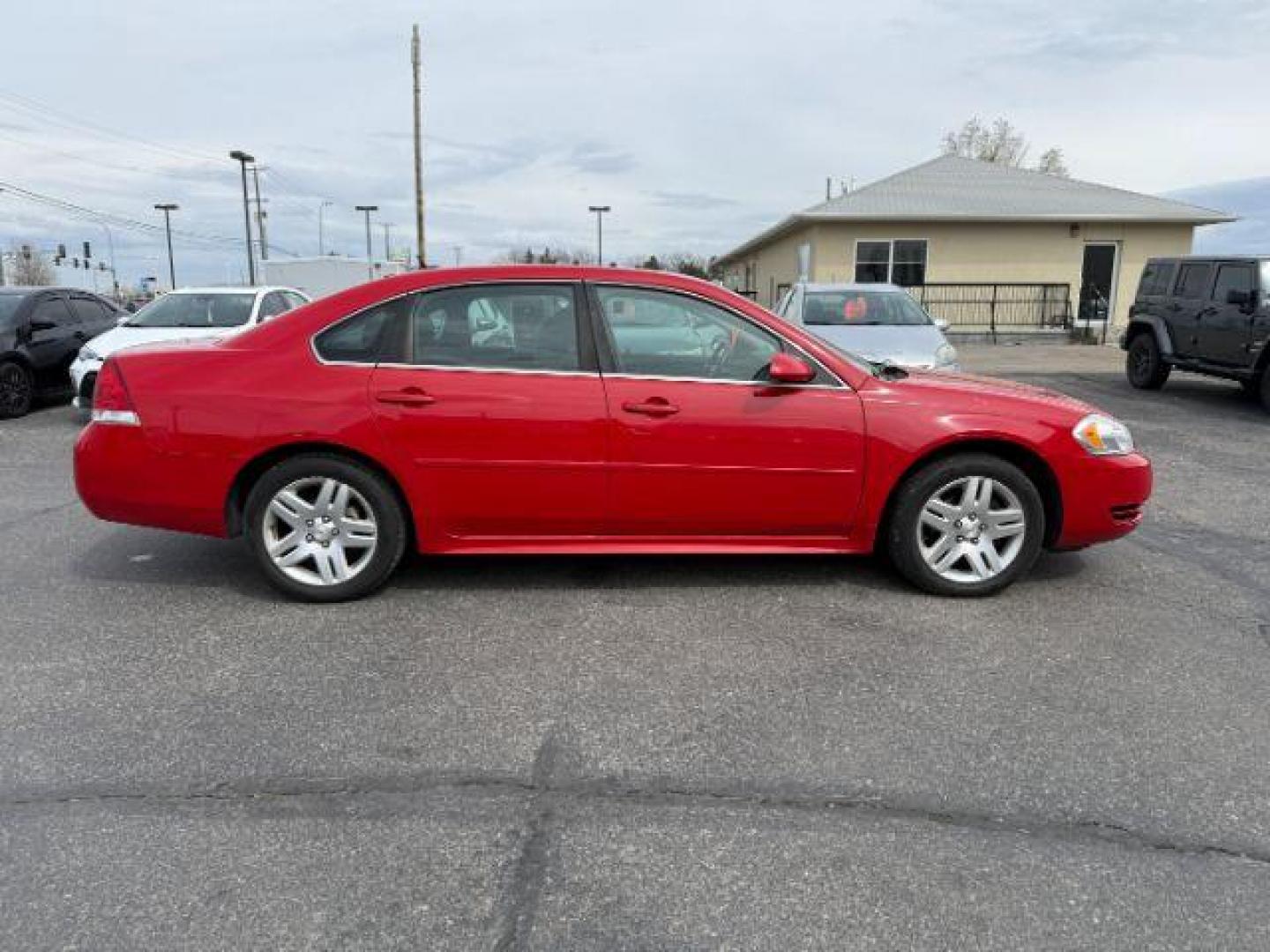 2012 RED /CLOTH Chevrolet Impala LT (Fleet) (2G1WG5E34C1) with an 3.6L V6 DOHC 16V FFV engine, 6-Speed Automatic transmission, located at 1235 N Woodruff Ave., Idaho Falls, 83401, (208) 523-1053, 43.507172, -112.000488 - At Timberline Auto, finding a great deal on your next vehicle is always easy! Our experienced sales staff's goal is to help find you the right vehicle at the right price! Our knowledgeable finance department has options for almost any credit score. We offer extended service contract options to prote - Photo#5