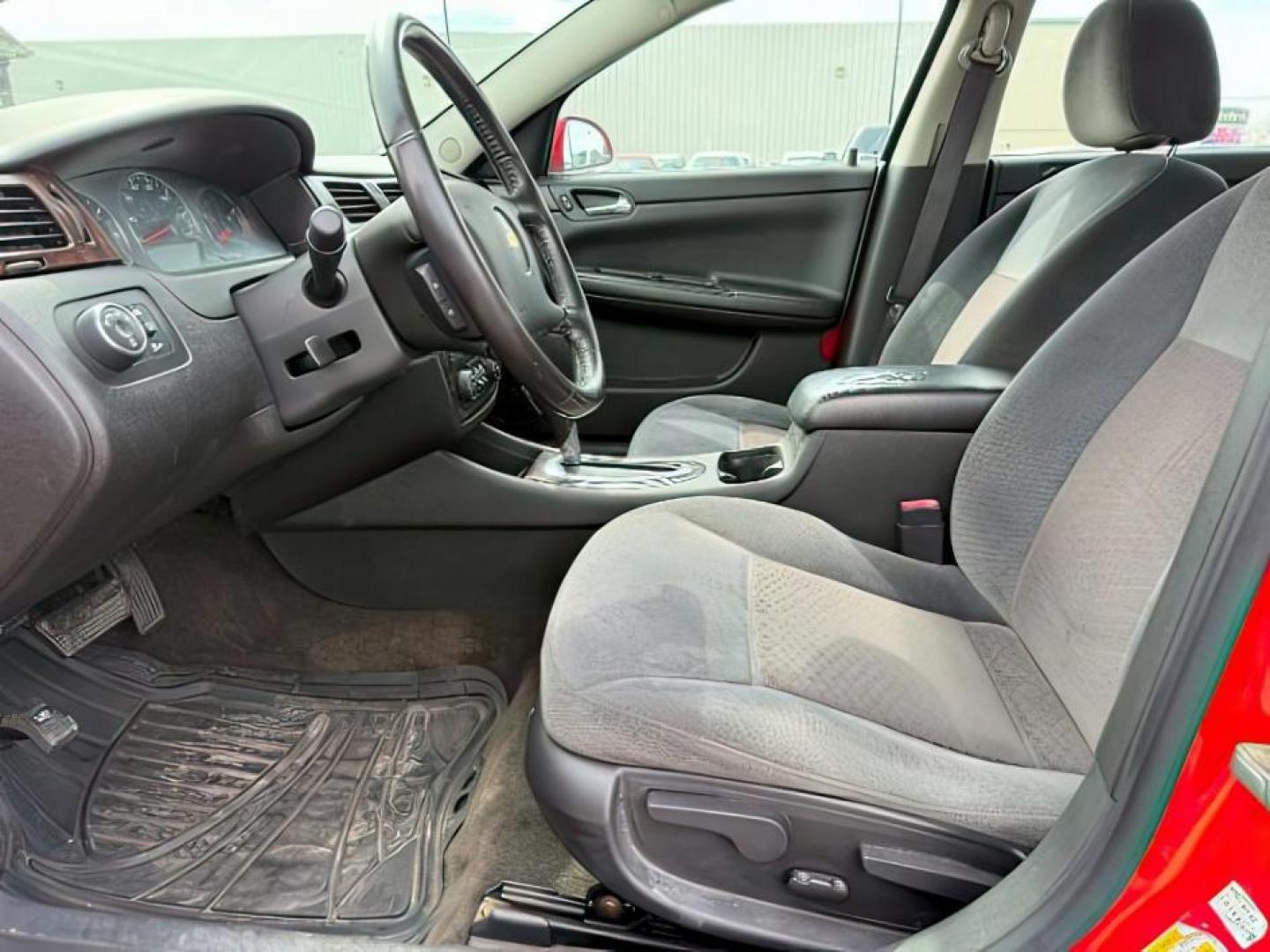 2012 RED /CLOTH Chevrolet Impala LT (Fleet) (2G1WG5E34C1) with an 3.6L V6 DOHC 16V FFV engine, 6-Speed Automatic transmission, located at 1235 N Woodruff Ave., Idaho Falls, 83401, (208) 523-1053, 43.507172, -112.000488 - At Timberline Auto, finding a great deal on your next vehicle is always easy! Our experienced sales staff's goal is to help find you the right vehicle at the right price! Our knowledgeable finance department has options for almost any credit score. We offer extended service contract options to prote - Photo#9