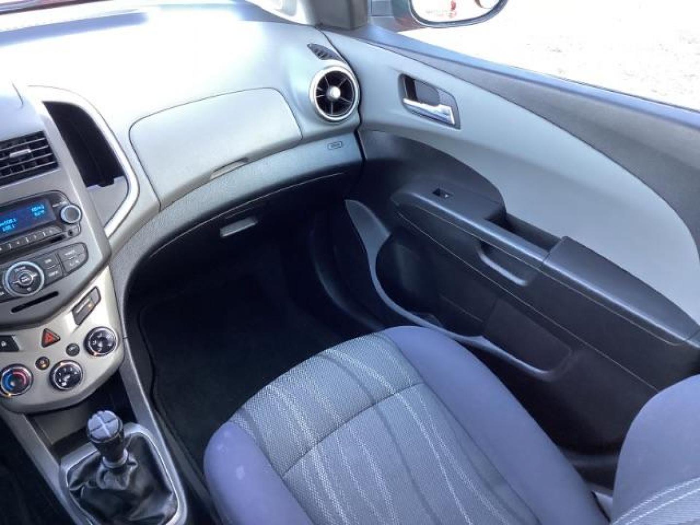 2012 Inferno Orange Metallic /Jet Blk/ Dark Titanium Cloth Interior Chevrolet Sonic 1LT 5-Door (1G1JD6SB5C4) with an 1.4L L4 DOHC 24V TURBO engine, 5-Speed Manual transmission, located at 1235 N Woodruff Ave., Idaho Falls, 83401, (208) 523-1053, 43.507172, -112.000488 - Get ready to enjoy a spirited drive with this 2012 Chevrolet Sonic Hatchback 1LT! Equipped with a peppy 1.4L turbocharged engine, this compact hatchback delivers impressive fuel efficiency without sacrificing performance. Perfect for urban commuting or weekend getaways, the Sonic combines style and - Photo#12