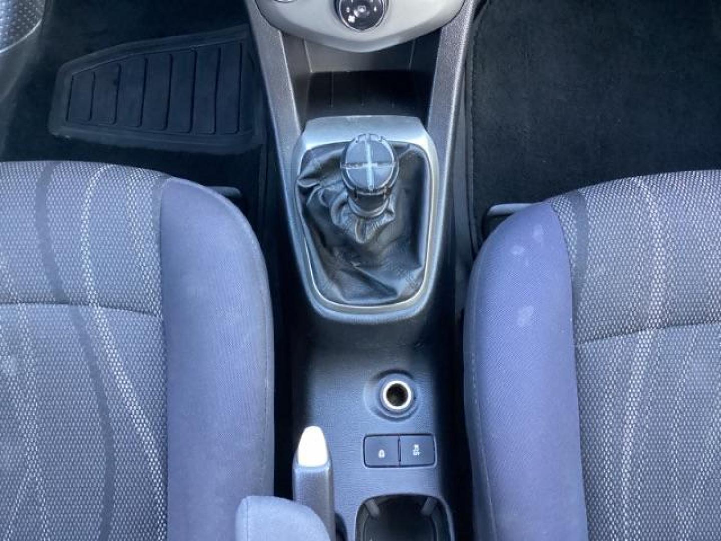2012 Inferno Orange Metallic /Jet Blk/ Dark Titanium Cloth Interior Chevrolet Sonic 1LT 5-Door (1G1JD6SB5C4) with an 1.4L L4 DOHC 24V TURBO engine, 5-Speed Manual transmission, located at 1235 N Woodruff Ave., Idaho Falls, 83401, (208) 523-1053, 43.507172, -112.000488 - Get ready to enjoy a spirited drive with this 2012 Chevrolet Sonic Hatchback 1LT! Equipped with a peppy 1.4L turbocharged engine, this compact hatchback delivers impressive fuel efficiency without sacrificing performance. Perfect for urban commuting or weekend getaways, the Sonic combines style and - Photo#13