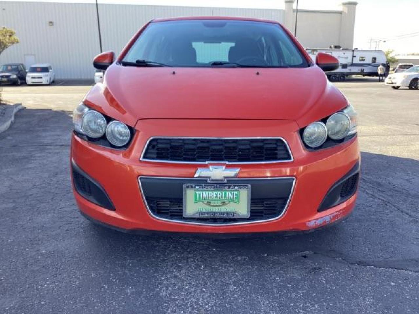 2012 Inferno Orange Metallic /Jet Blk/ Dark Titanium Cloth Interior Chevrolet Sonic 1LT 5-Door (1G1JD6SB5C4) with an 1.4L L4 DOHC 24V TURBO engine, 5-Speed Manual transmission, located at 1235 N Woodruff Ave., Idaho Falls, 83401, (208) 523-1053, 43.507172, -112.000488 - Get ready to enjoy a spirited drive with this 2012 Chevrolet Sonic Hatchback 1LT! Equipped with a peppy 1.4L turbocharged engine, this compact hatchback delivers impressive fuel efficiency without sacrificing performance. Perfect for urban commuting or weekend getaways, the Sonic combines style and - Photo#8