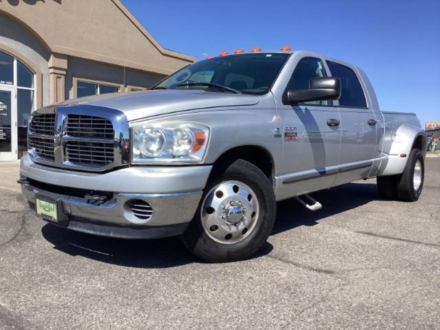 2007 Bright Silver Metallic /Medium Slate Gray Cloth Interior Dodge Ram 3500 SLT Mega Cab 2WD DRW (3D7ML49A07G) with an 6.7L L6 OHV 24V TURBO DIESEL engine, 4-Speed Automatic transmission, located at 1235 N Woodruff Ave., Idaho Falls, 83401, (208) 523-1053, 43.507172, -112.000488 - Photo#1
