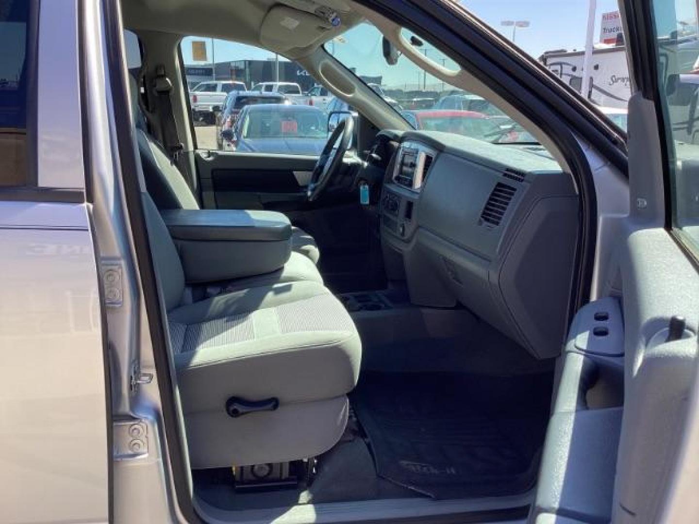 2007 Bright Silver Metallic /Medium Slate Gray Cloth Interior Dodge Ram 3500 SLT Mega Cab 2WD DRW (3D7ML49A07G) with an 6.7L L6 OHV 24V TURBO DIESEL engine, 4-Speed Automatic transmission, located at 1235 N Woodruff Ave., Idaho Falls, 83401, (208) 523-1053, 43.507172, -112.000488 - Photo#25