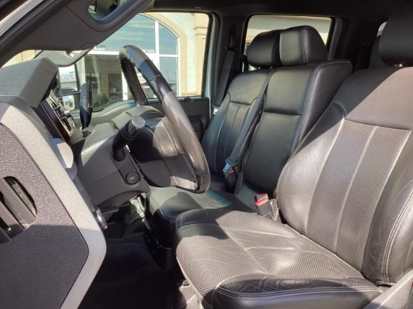2012 Ingot Silver Metallic /Black Leather Interior Ford F-350 SD Lariat Crew Cab Long Bed 4WD (1FT8W3BT4CE) with an 6.7L V8 OHV 16V DIESEL engine, 6-Speed Automatic transmission, located at 1235 N Woodruff Ave., Idaho Falls, 83401, (208) 523-1053, 43.507172, -112.000488 - At Timberline Auto, finding a great deal on your next vehicle is always easy! Our experienced sales staff's goal is to help find you the right vehicle at the right price! Our knowledgeable finance department has options for almost any credit score. We offer extended service contract options to prote - Photo#10