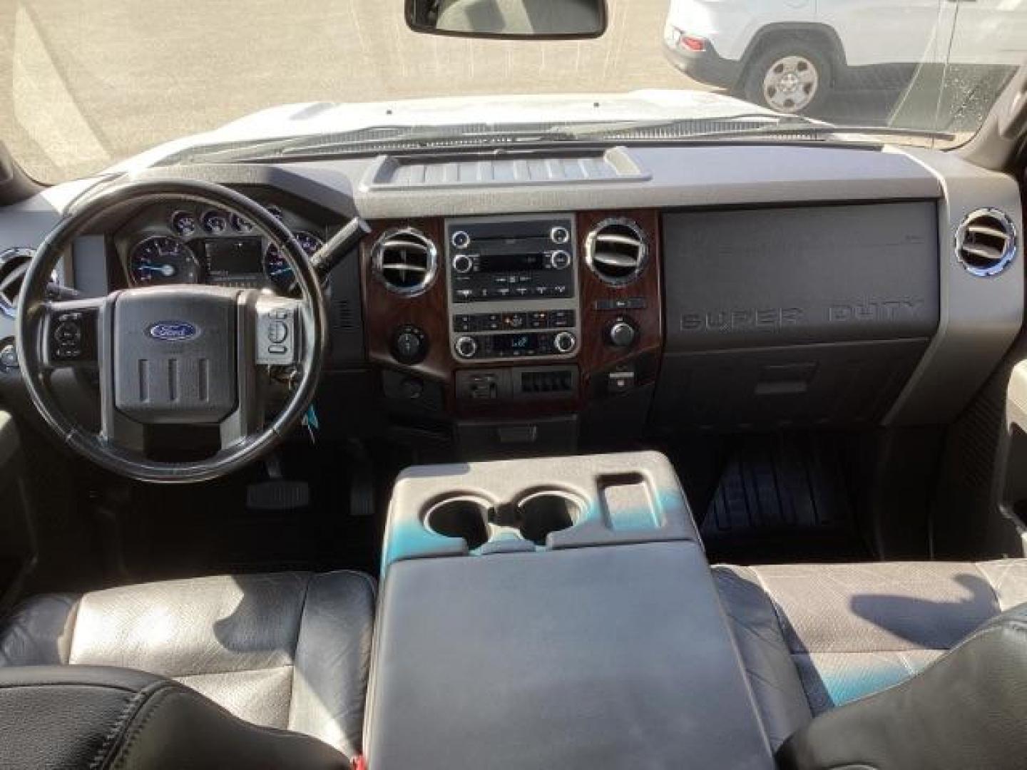 2012 Ingot Silver Metallic /Black Leather Interior Ford F-350 SD Lariat Crew Cab Long Bed 4WD (1FT8W3BT4CE) with an 6.7L V8 OHV 16V DIESEL engine, 6-Speed Automatic transmission, located at 1235 N Woodruff Ave., Idaho Falls, 83401, (208) 523-1053, 43.507172, -112.000488 - At Timberline Auto, finding a great deal on your next vehicle is always easy! Our experienced sales staff's goal is to help find you the right vehicle at the right price! Our knowledgeable finance department has options for almost any credit score. We offer extended service contract options to prote - Photo#11
