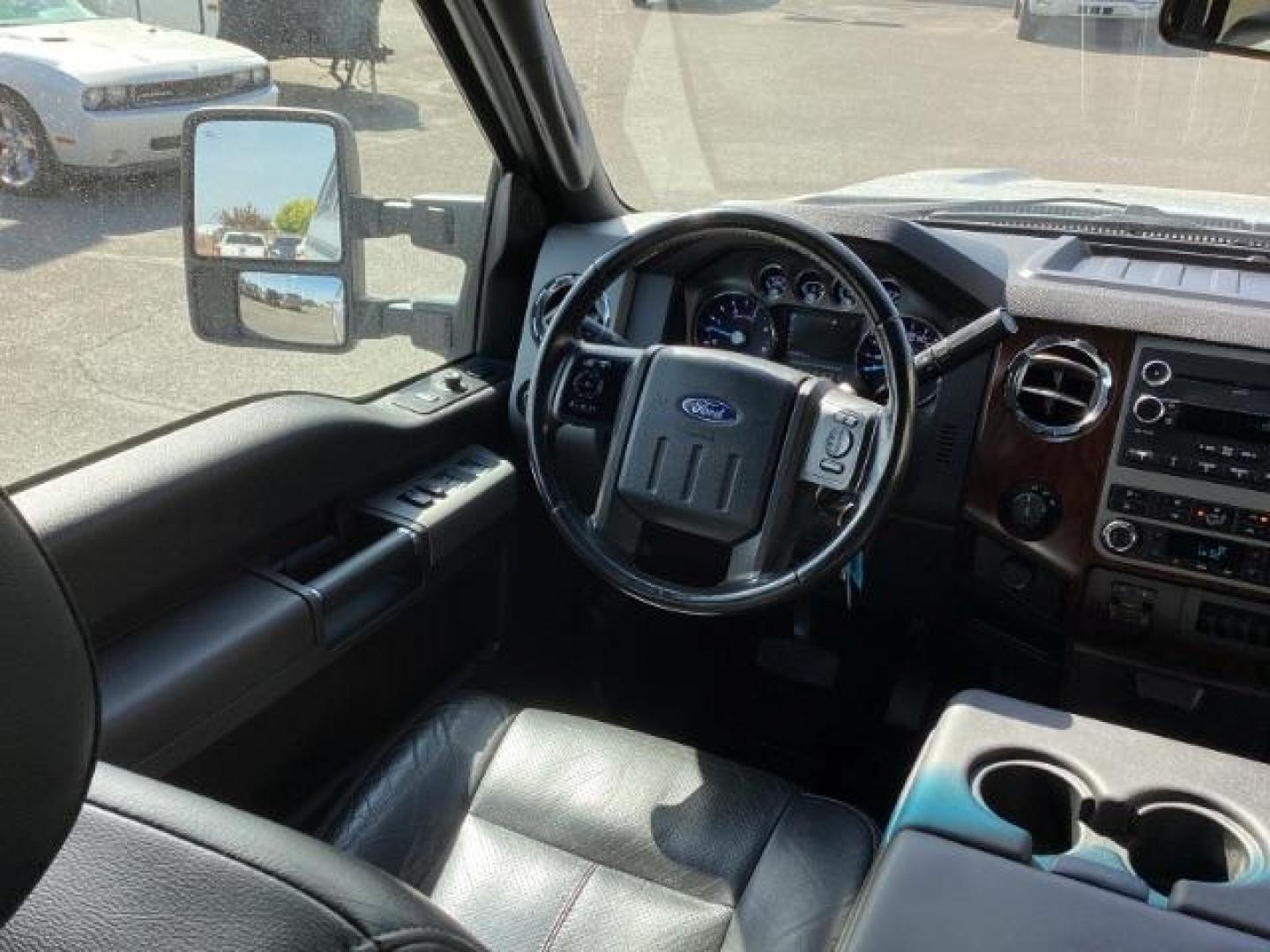 2012 Ingot Silver Metallic /Black Leather Interior Ford F-350 SD Lariat Crew Cab Long Bed 4WD (1FT8W3BT4CE) with an 6.7L V8 OHV 16V DIESEL engine, 6-Speed Automatic transmission, located at 1235 N Woodruff Ave., Idaho Falls, 83401, (208) 523-1053, 43.507172, -112.000488 - At Timberline Auto, finding a great deal on your next vehicle is always easy! Our experienced sales staff's goal is to help find you the right vehicle at the right price! Our knowledgeable finance department has options for almost any credit score. We offer extended service contract options to prote - Photo#12