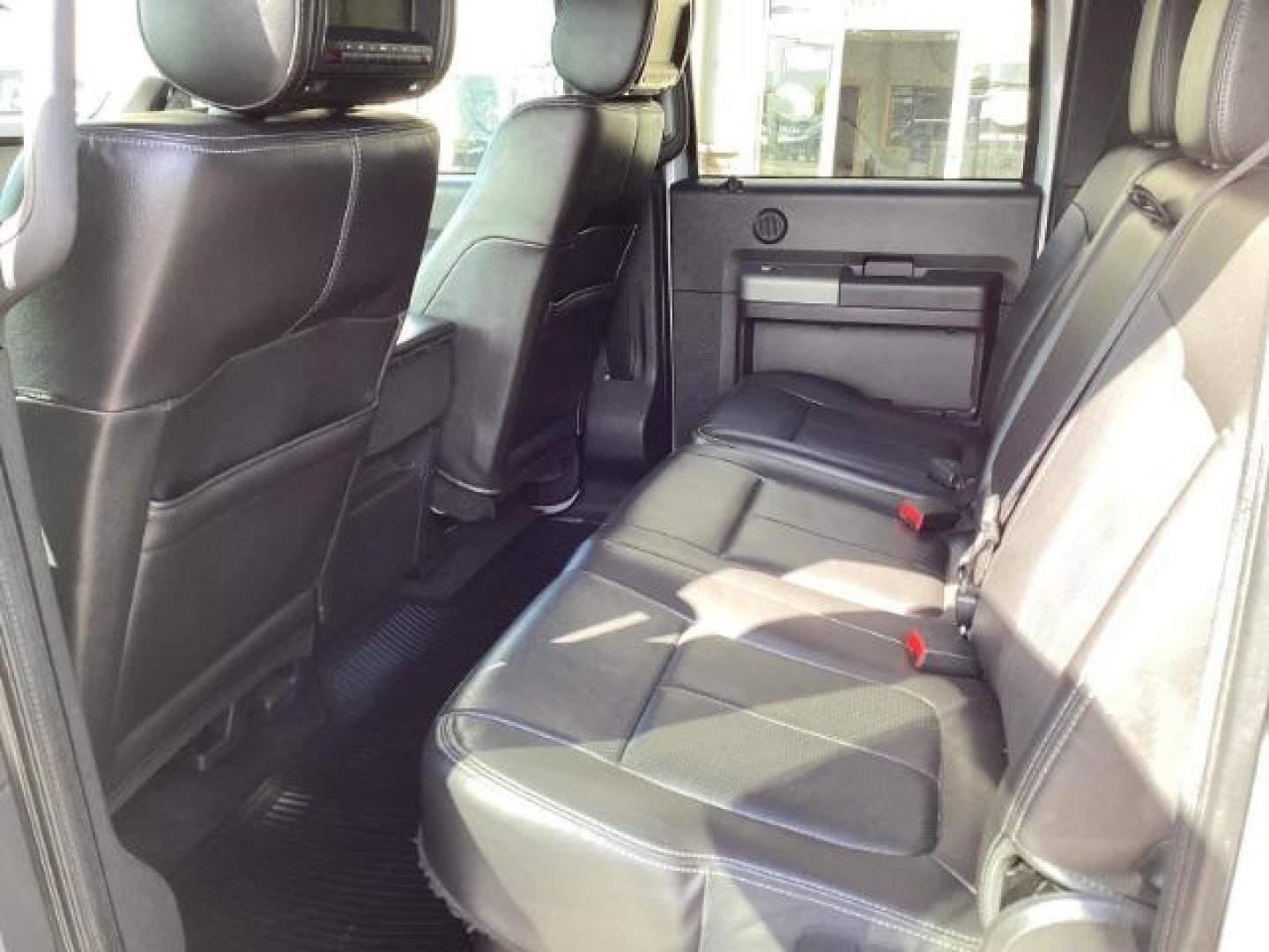 2012 Ingot Silver Metallic /Black Leather Interior Ford F-350 SD Lariat Crew Cab Long Bed 4WD (1FT8W3BT4CE) with an 6.7L V8 OHV 16V DIESEL engine, 6-Speed Automatic transmission, located at 1235 N Woodruff Ave., Idaho Falls, 83401, (208) 523-1053, 43.507172, -112.000488 - At Timberline Auto, finding a great deal on your next vehicle is always easy! Our experienced sales staff's goal is to help find you the right vehicle at the right price! Our knowledgeable finance department has options for almost any credit score. We offer extended service contract options to prote - Photo#24
