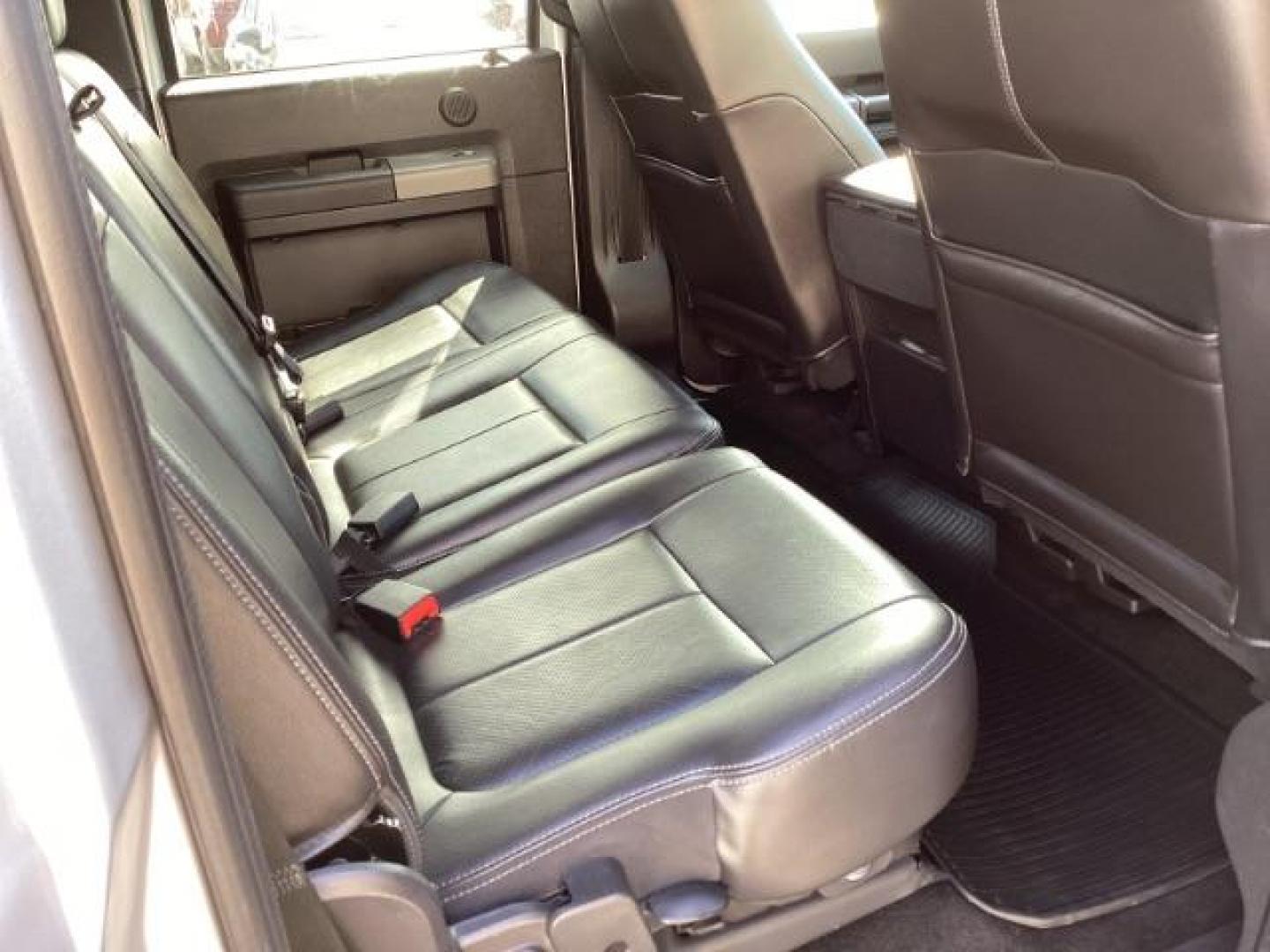 2012 Ingot Silver Metallic /Black Leather Interior Ford F-350 SD Lariat Crew Cab Long Bed 4WD (1FT8W3BT4CE) with an 6.7L V8 OHV 16V DIESEL engine, 6-Speed Automatic transmission, located at 1235 N Woodruff Ave., Idaho Falls, 83401, (208) 523-1053, 43.507172, -112.000488 - At Timberline Auto, finding a great deal on your next vehicle is always easy! Our experienced sales staff's goal is to help find you the right vehicle at the right price! Our knowledgeable finance department has options for almost any credit score. We offer extended service contract options to prote - Photo#26