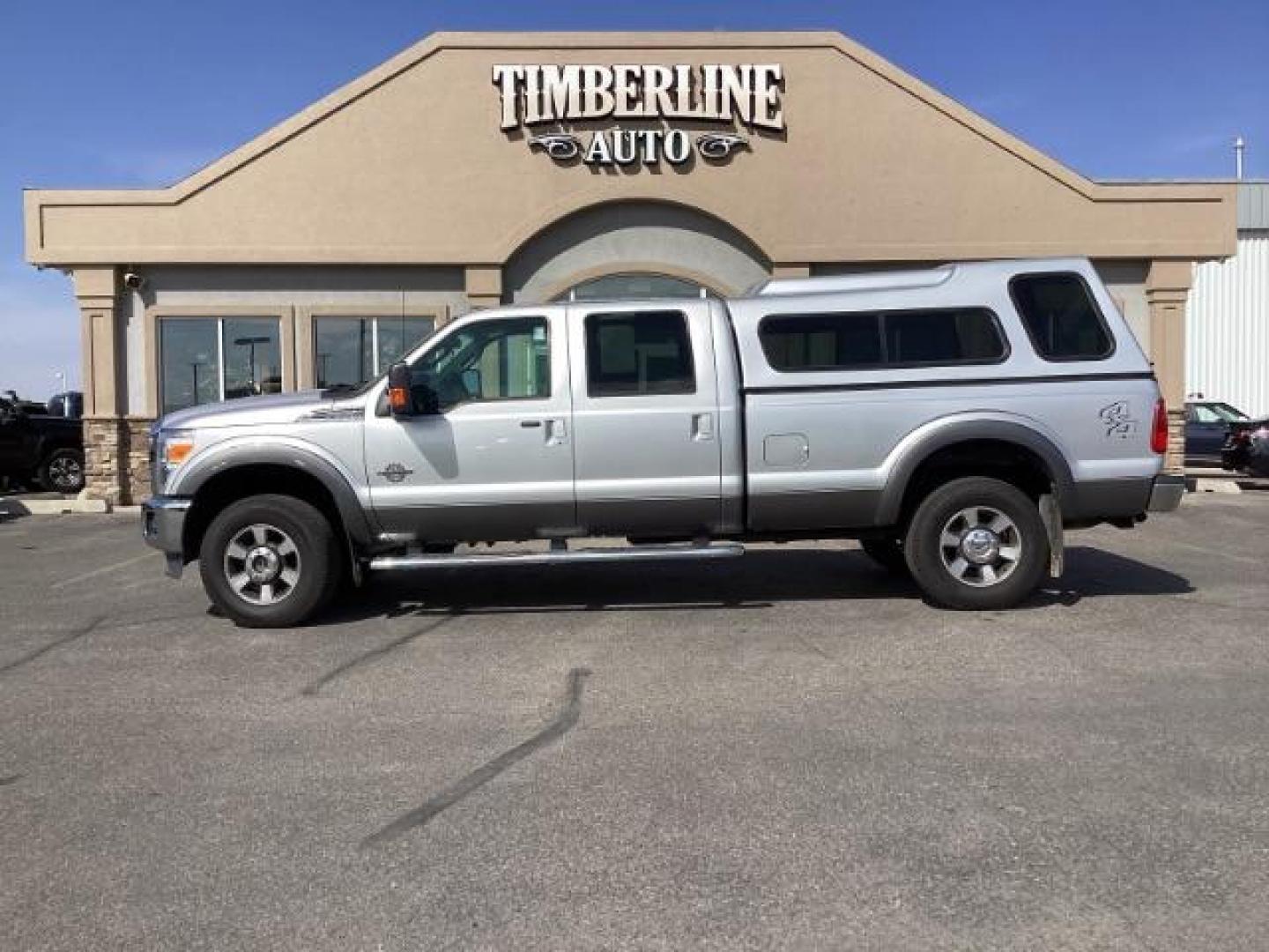 2012 Ingot Silver Metallic /Black Leather Interior Ford F-350 SD Lariat Crew Cab Long Bed 4WD (1FT8W3BT4CE) with an 6.7L V8 OHV 16V DIESEL engine, 6-Speed Automatic transmission, located at 1235 N Woodruff Ave., Idaho Falls, 83401, (208) 523-1053, 43.507172, -112.000488 - At Timberline Auto, finding a great deal on your next vehicle is always easy! Our experienced sales staff's goal is to help find you the right vehicle at the right price! Our knowledgeable finance department has options for almost any credit score. We offer extended service contract options to prote - Photo#2