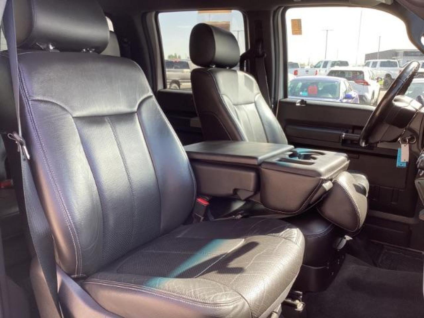 2012 Ingot Silver Metallic /Black Leather Interior Ford F-350 SD Lariat Crew Cab Long Bed 4WD (1FT8W3BT4CE) with an 6.7L V8 OHV 16V DIESEL engine, 6-Speed Automatic transmission, located at 1235 N Woodruff Ave., Idaho Falls, 83401, (208) 523-1053, 43.507172, -112.000488 - At Timberline Auto, finding a great deal on your next vehicle is always easy! Our experienced sales staff's goal is to help find you the right vehicle at the right price! Our knowledgeable finance department has options for almost any credit score. We offer extended service contract options to prote - Photo#29