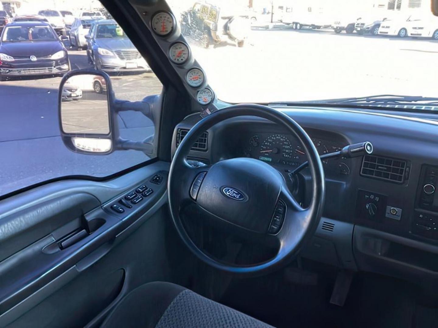 2002 SILVER /Medium Flint Cloth Trim Ford F-250 SD (1FTNW21F02E) with an 73L V8 OHV 16V TURBO DIESEL engine, Automatic transmission, located at 1175 N Woodruff Ave, Idaho Falls, ID, 83401, 43.506901, -111.999657 - At Timberline Auto, finding a great deal on your next vehicle is always easy! Our experienced sales staff's goal is to help find you the right vehicle at the right price! Our knowledgeable finance department has options for almost any credit score. We offer extended service contract options to prote - Photo#11
