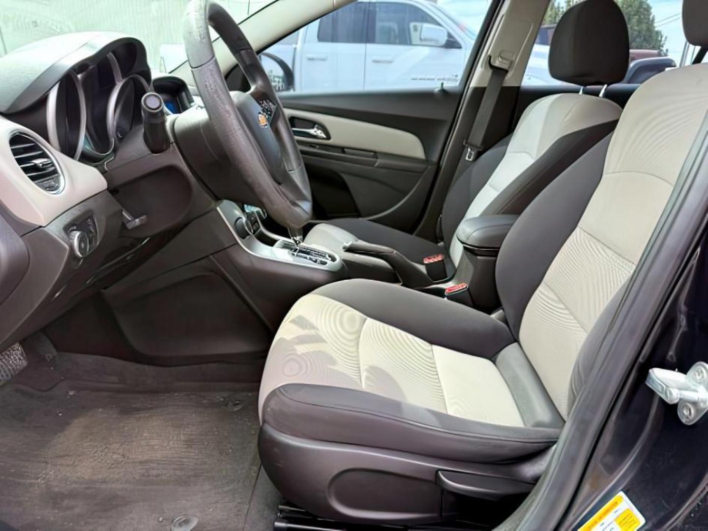 2014 Black Granite Metallic /Jet Black/Medium Titanium Chevrolet Cruze LS Auto (1G1PA5SH5E7) with an 1.8L L4 DOHC 16V FFV engine, 6-Speed Automatic transmission, located at 1235 N Woodruff Ave., Idaho Falls, 83401, (208) 523-1053, 43.507172, -112.000488 - At Timberline Auto, finding a great deal on your next vehicle is always easy! Our experienced sales staff's goal is to help find you the right vehicle at the right price! Our knowledgeable finance department has options for almost any credit score. We offer extended service contract options to prote - Photo#9