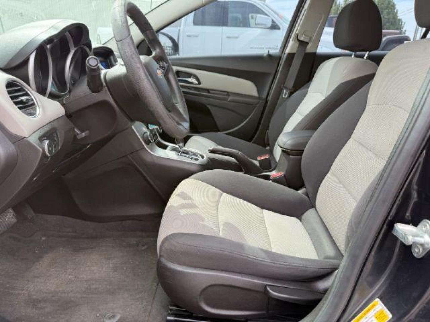 2014 Black Granite Metallic /Jet Black/Medium Titanium Chevrolet Cruze LS Auto (1G1PA5SH5E7) with an 1.8L L4 DOHC 16V FFV engine, 6-Speed Automatic transmission, located at 1235 N Woodruff Ave., Idaho Falls, 83401, (208) 523-1053, 43.507172, -112.000488 - At Timberline Auto, finding a great deal on your next vehicle is always easy! Our experienced sales staff's goal is to help find you the right vehicle at the right price! Our knowledgeable finance department has options for almost any credit score. We offer extended service contract options to prote - Photo#9