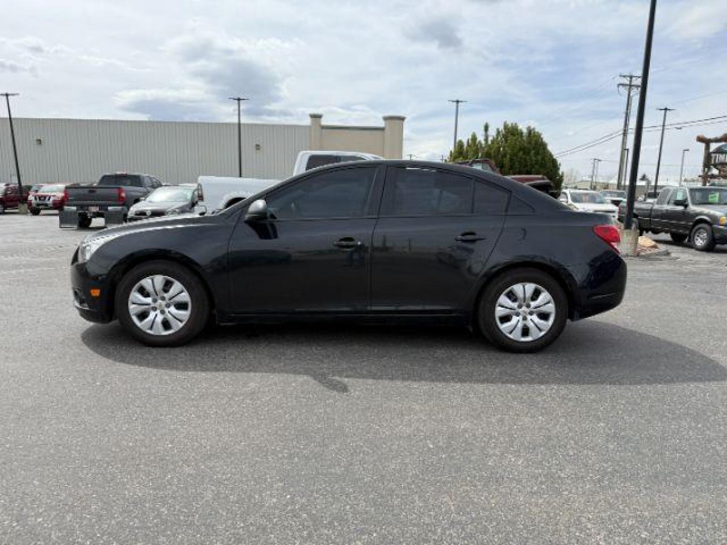 2014 Black Granite Metallic /Jet Black/Medium Titanium Chevrolet Cruze LS Auto (1G1PA5SH5E7) with an 1.8L L4 DOHC 16V FFV engine, 6-Speed Automatic transmission, located at 1235 N Woodruff Ave., Idaho Falls, 83401, (208) 523-1053, 43.507172, -112.000488 - At Timberline Auto, finding a great deal on your next vehicle is always easy! Our experienced sales staff's goal is to help find you the right vehicle at the right price! Our knowledgeable finance department has options for almost any credit score. We offer extended service contract options to prote - Photo#1