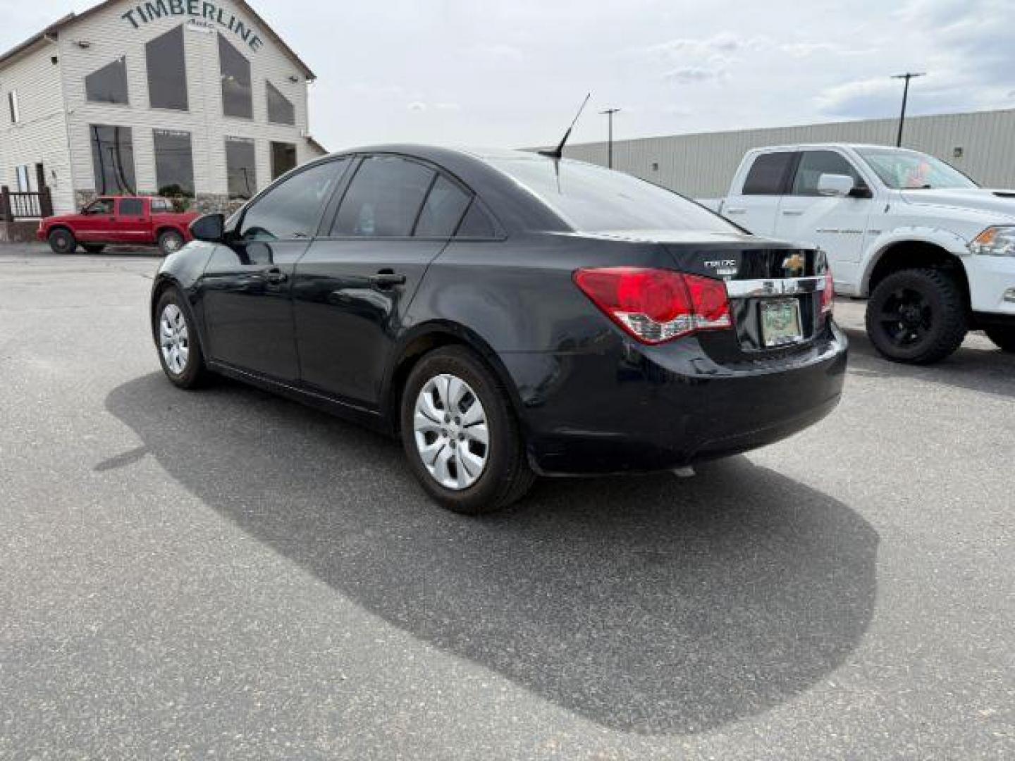 2014 Black Granite Metallic /Jet Black/Medium Titanium Chevrolet Cruze LS Auto (1G1PA5SH5E7) with an 1.8L L4 DOHC 16V FFV engine, 6-Speed Automatic transmission, located at 1235 N Woodruff Ave., Idaho Falls, 83401, (208) 523-1053, 43.507172, -112.000488 - At Timberline Auto, finding a great deal on your next vehicle is always easy! Our experienced sales staff's goal is to help find you the right vehicle at the right price! Our knowledgeable finance department has options for almost any credit score. We offer extended service contract options to prote - Photo#2