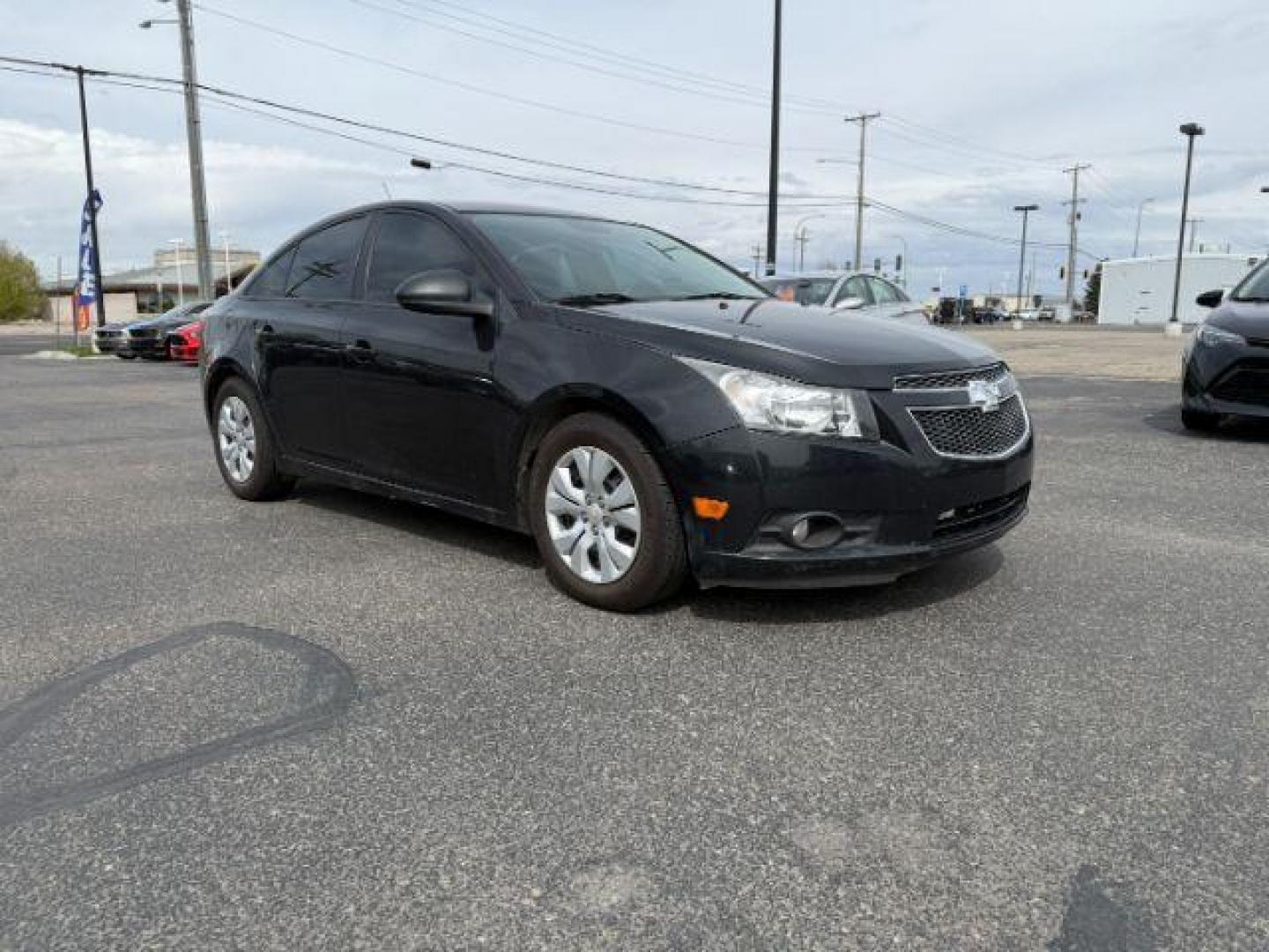 2014 Black Granite Metallic /Jet Black/Medium Titanium Chevrolet Cruze LS Auto (1G1PA5SH5E7) with an 1.8L L4 DOHC 16V FFV engine, 6-Speed Automatic transmission, located at 1235 N Woodruff Ave., Idaho Falls, 83401, (208) 523-1053, 43.507172, -112.000488 - At Timberline Auto, finding a great deal on your next vehicle is always easy! Our experienced sales staff's goal is to help find you the right vehicle at the right price! Our knowledgeable finance department has options for almost any credit score. We offer extended service contract options to prote - Photo#6
