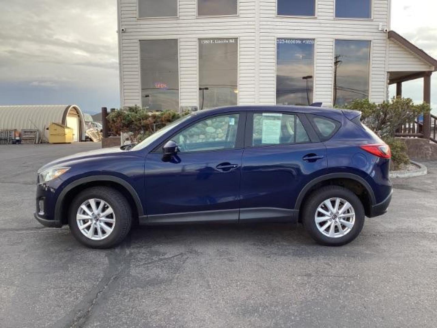 2014 BLUE Mazda CX-5 NA (JM3KE2BE6E0) , located at 1235 N Woodruff Ave., Idaho Falls, 83401, (208) 523-1053, 43.507172, -112.000488 - Photo#2