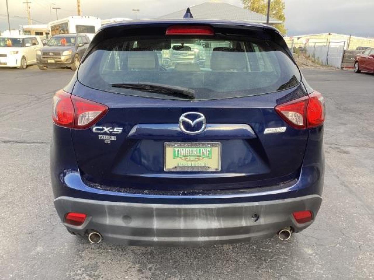 2014 BLUE Mazda CX-5 NA (JM3KE2BE6E0) , located at 1235 N Woodruff Ave., Idaho Falls, 83401, (208) 523-1053, 43.507172, -112.000488 - Photo#4