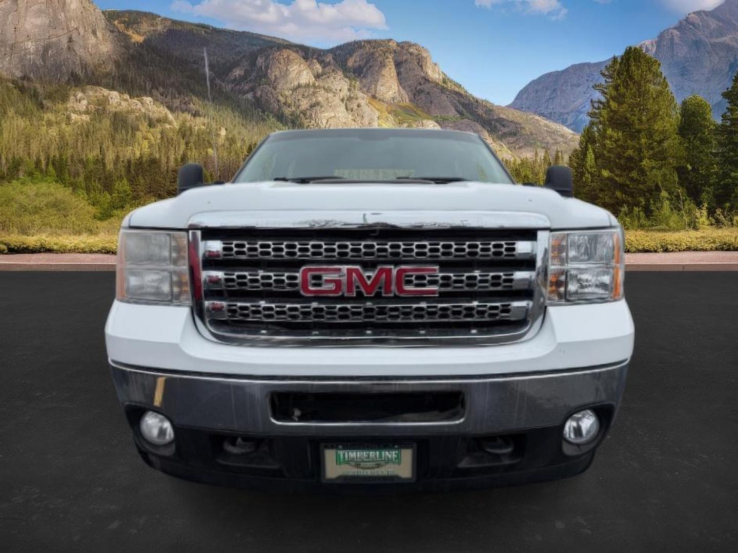 2013 Summit White /Ebony Cloth Interior GMC Sierra 3500HD (1GT423C80DF) with an 66L V8 32V OHV DIESEL engine, Automatic transmission, located at 1175 N Woodruff Ave, Idaho Falls, ID, 83401, 43.506901, -111.999657 - At Timberline Auto, finding a great deal on your next vehicle is always easy! Our experienced sales staff's goal is to help find you the right vehicle at the right price! Our knowledgeable finance department has options for almost any credit score. We offer extended service contract options to prote - Photo#7