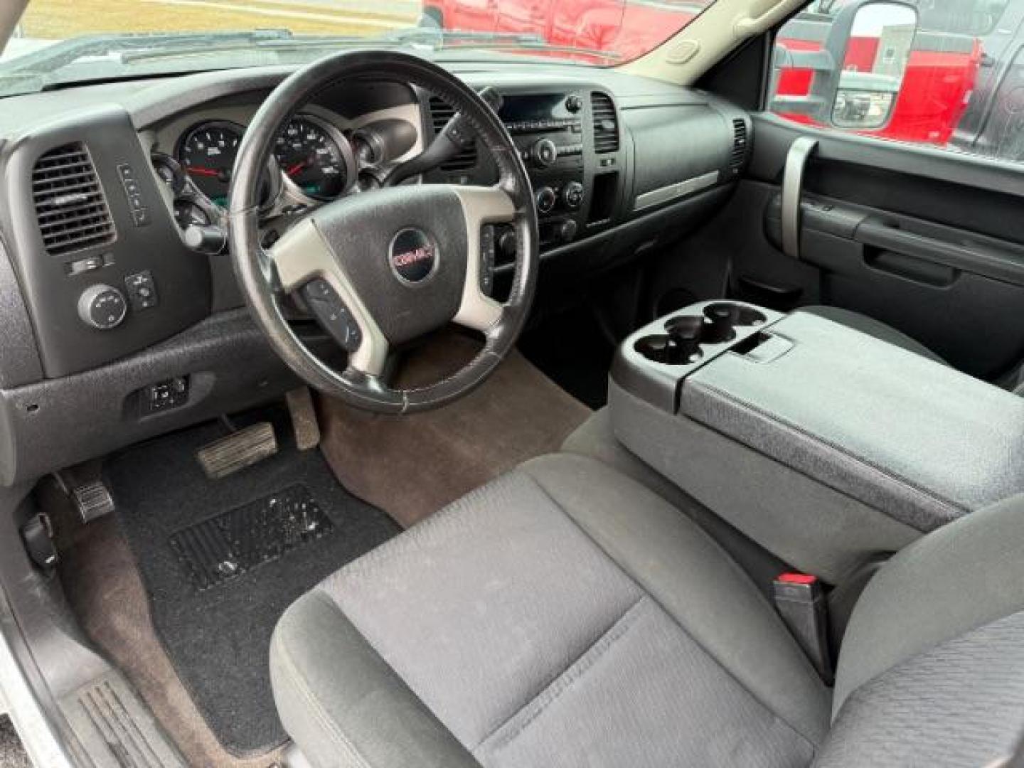 2013 Summit White /Ebony Cloth Interior GMC Sierra 3500HD SLE Crew Cab Long Box 4WD (1GT423C80DF) with an 6.6L V8 32V OHV DIESEL engine, 6-Speed Automatic transmission, located at 1235 N Woodruff Ave., Idaho Falls, 83401, (208) 523-1053, 43.507172, -112.000488 - At Timberline Auto, finding a great deal on your next vehicle is always easy! Our experienced sales staff's goal is to help find you the right vehicle at the right price! Our knowledgeable finance department has options for almost any credit score. We offer extended service contract options to prote - Photo#13